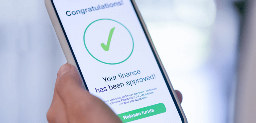 Image of phone showing loan approval