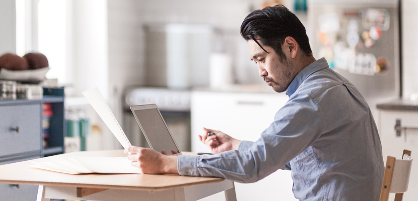 Man working at office using laptop