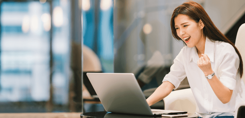 happy lady with laptop